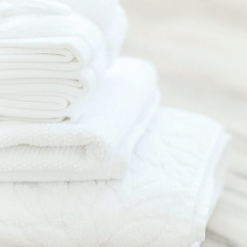folded white towels