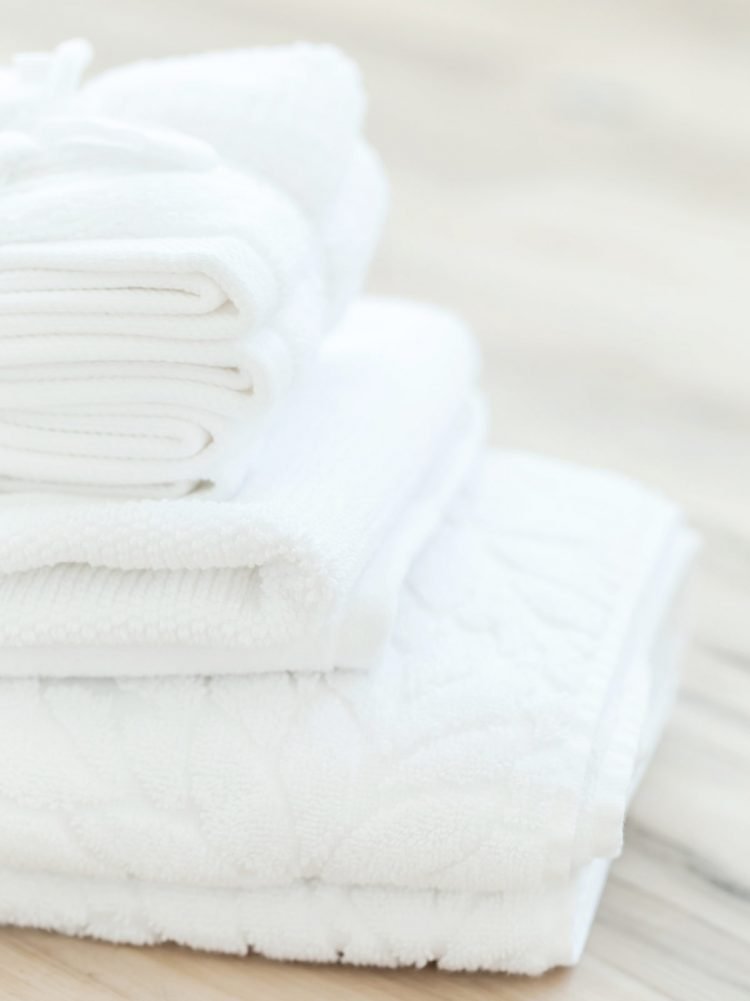 folded white towels