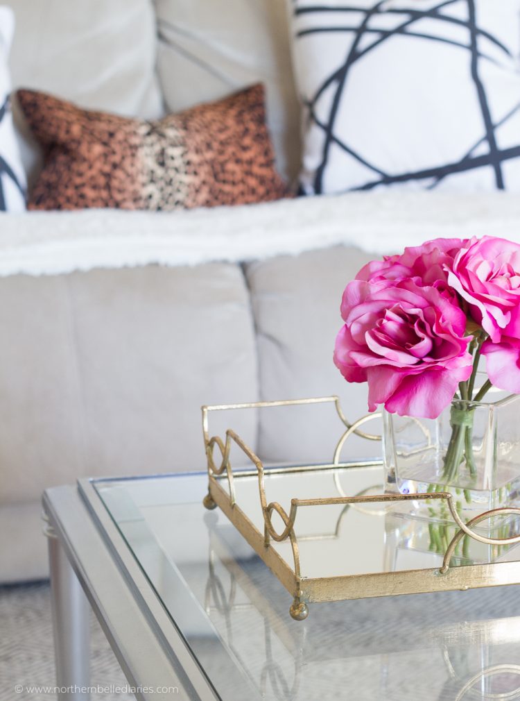 Black and white living room, leopard pillow, grey channels pillow, fiddle leaf fig, and Benjamin Moore Winds Breath