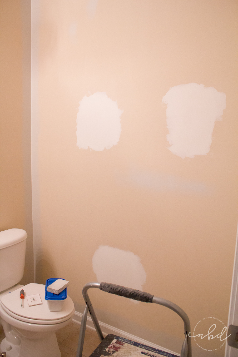 Elegant Half Bath on a Budget using Devine Color Wallpaper | patching up builder grade TP and towel holders