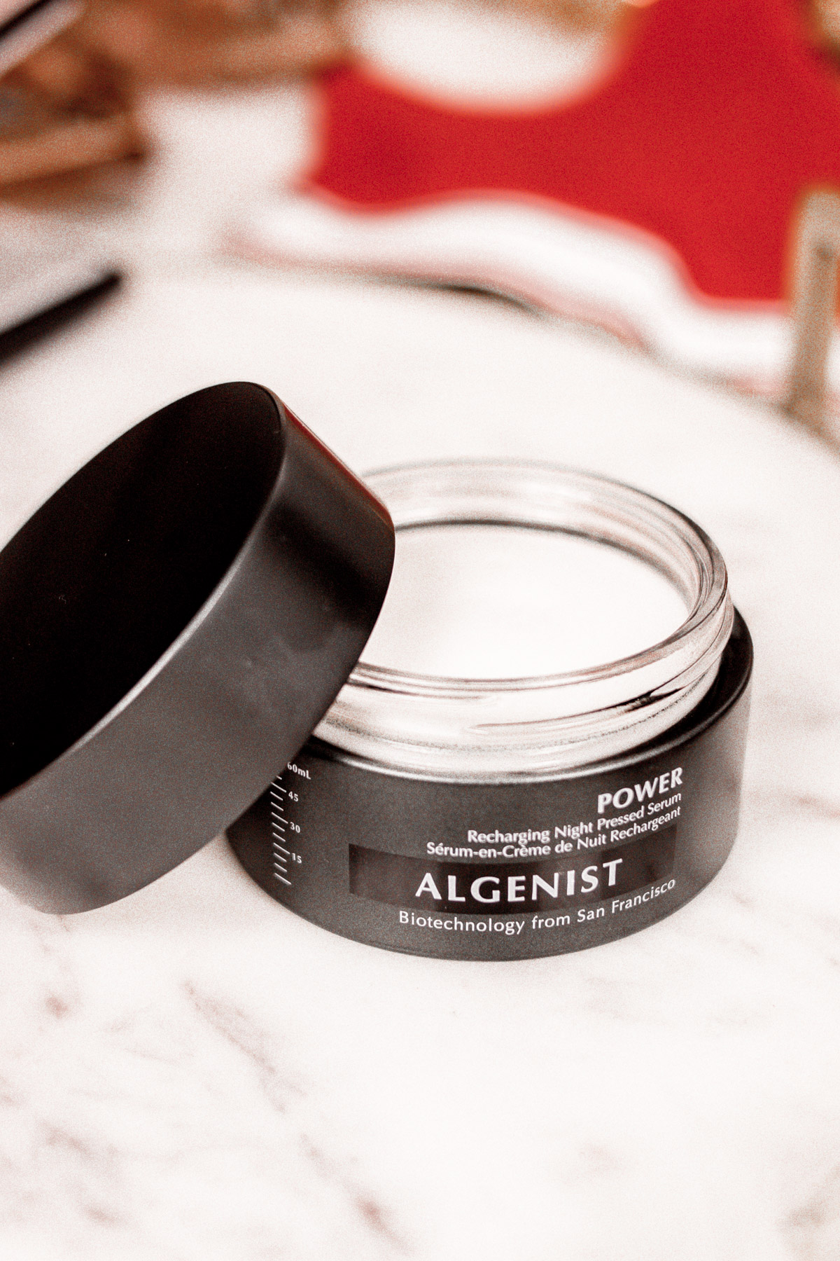 Algenist Pressed Serum with its lid open