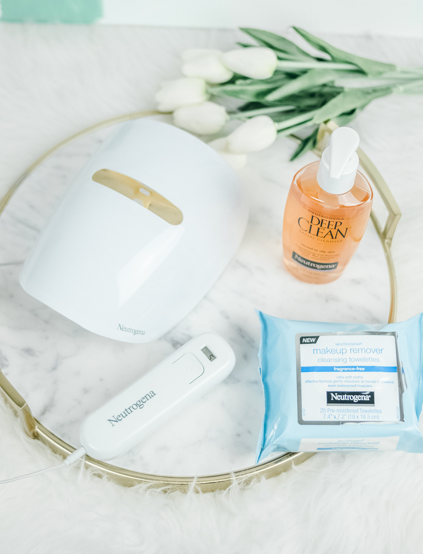 Neutrogena Light Therapy acne mask, Deep Clean cleanser, and makeup removing towelettes
