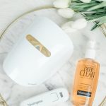Neutrogena Light Therapy Acne Mask on marble tray with Neutrogena Deep Clean acne cleanser